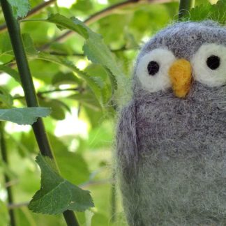 wool owl in tree