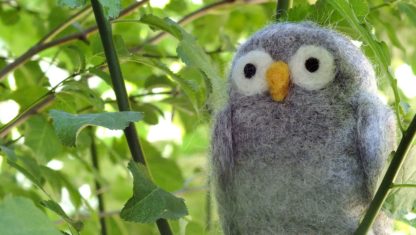 wool owl in tree